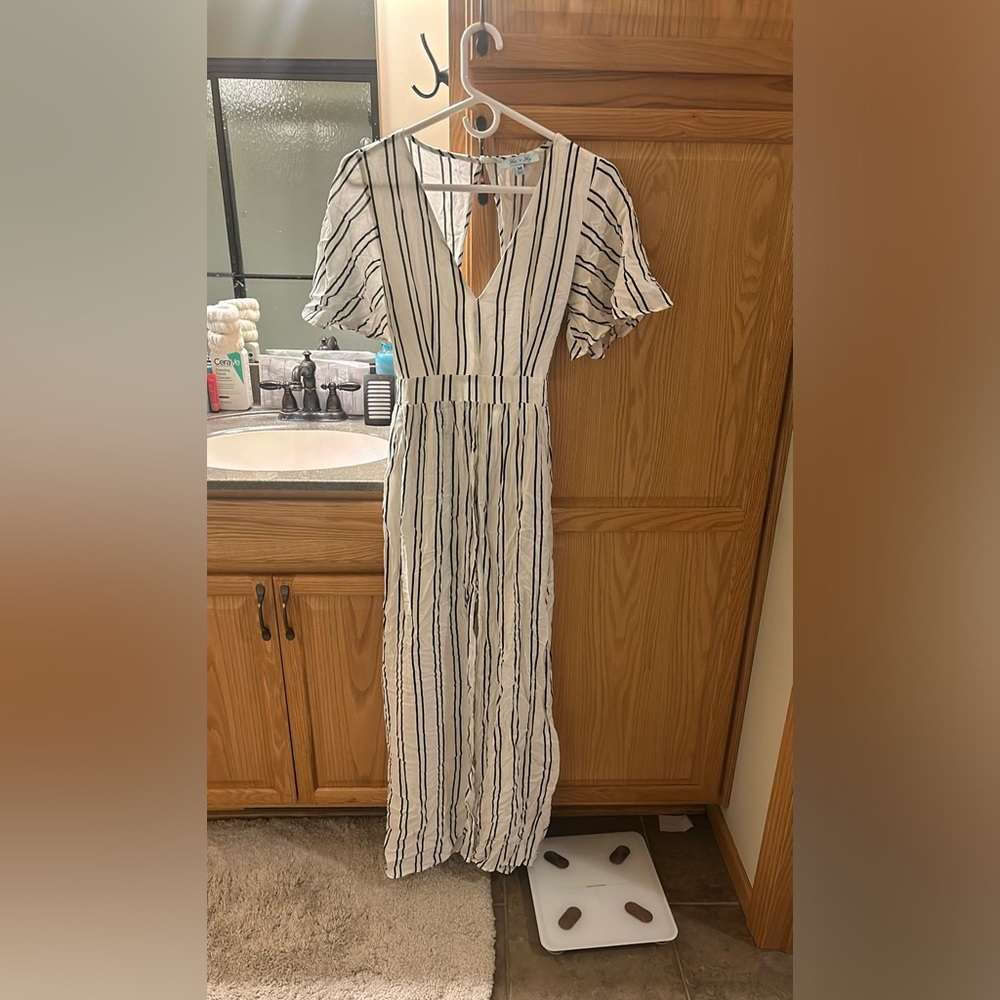 White and black stripped overlay romper.